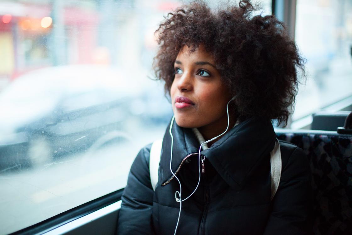 woman riding bus