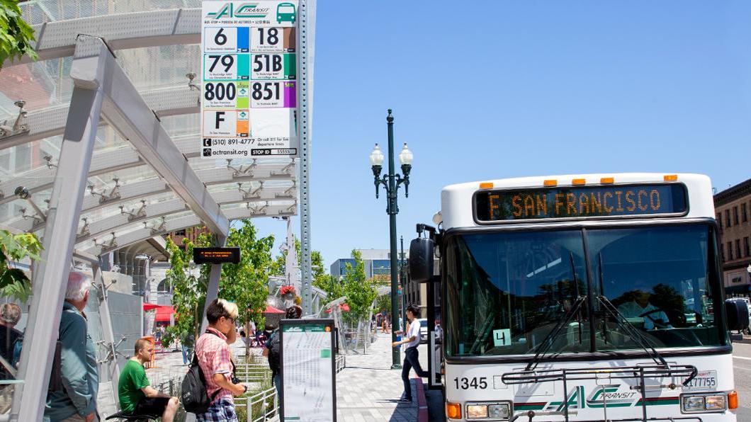 Line F waiting at bus stop